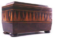  Tunbridge ware tea chest with parquetry in various woods, the interior canisters continuing the pattern of the sides, circa 1825. ef35.jpg (32349 bytes)