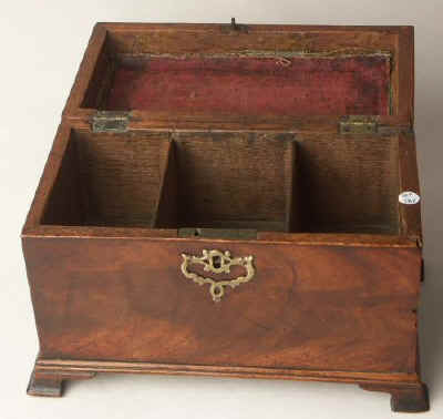 A flame mahogany tea chest  Chippendale form with a secret  drawer Circa 1770
