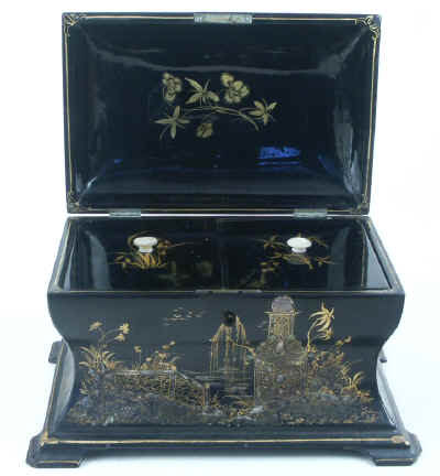 Hygra: Curvaceous Papier mch caddy with chinoiserie decoration stamped Jennens & Bettridge, circa 1845.