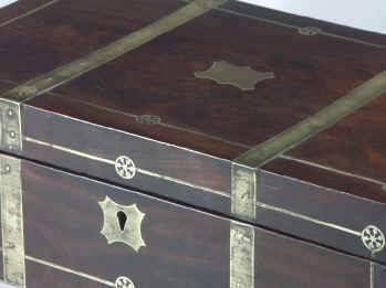 Dark mahogany writing box inlaid with brass Circa 1820.
