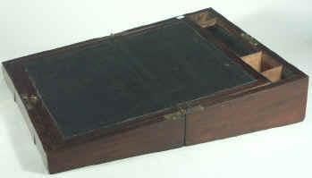 Dark mahogany writing box inlaid with brass Circa 1820.