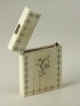 An  ivory card case with fine piqu inlay in silver. English, circa 1800.