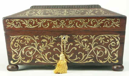 A shaped Regency gadrooned  and brass inlaid Rosewood  box with fitted jewellery tray, circa 1825. Enlarge Picture