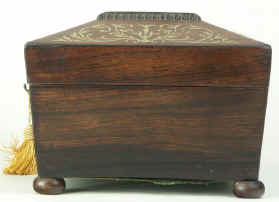 A shaped Regency gadrooned  and brass inlaid Rosewood  box with fitted jewellery tray, circa 1825. Enlarge Picture