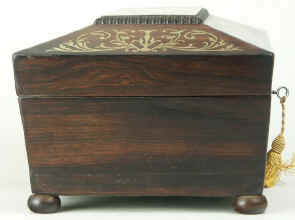 A shaped Regency gadrooned  and brass inlaid Rosewood  box with fitted jewellery tray, circa 1825. Enlarge Picture