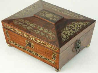 A shaped Regency  brass inlaid Rosewood  box with  jewellery tray, circa 1825. Enlarge Picture