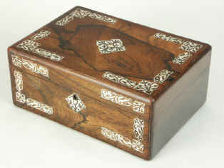 A rosewood veneered box, inlaid with mother of pearl pattern, Circa 1840. Enlarge Picture