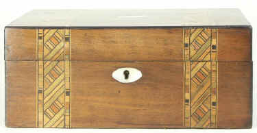 Victorian walnut veneered box inlaid in strips of geometric marquetry circa 1880. Enlarge Picture