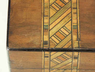 Victorian walnut veneered box inlaid in strips of geometric marquetry circa 1880. Enlarge Picture