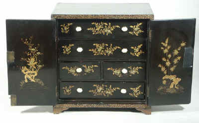 A Chinese Export Lacquer Table Cabinet with Gold Decoration Circa 1850. Enlarge Picture