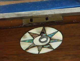 Victorian walnut veneered box inlaid with mother of pearl and and abalone circa 1880. Enlarge Picture