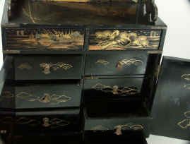 A Japanese Lacquered Table Cabinet Decorated with raised gold Circa 1870 Enlarge Picture