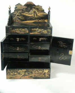 A Japanese Lacquered Table Cabinet Decorated with raised gold Circa 1870 Enlarge Picture