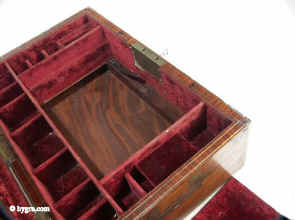 Exceptional kingwood and brass inlaid box circa 1820 with rare secret compartment.  Enlarge Picture