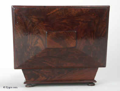 A Georgian solid mahogany box of Pyramid inspired shape on turned feet Circa 1810.