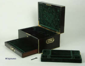 A coromandel ebony box with brass edging with a drawer and tray fited for jewelry circa 1860. Enlarge Picture