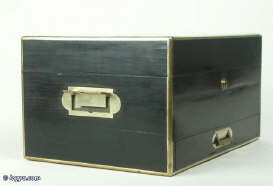 A coromandel ebony box with brass edging with a drawer and tray fited for jewelry circa 1860. Enlarge Picture