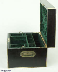 A coromandel ebony box with brass edging with a drawer and tray fited for jewelry circa 1860. Enlarge Picture