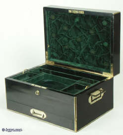 A coromandel ebony box with brass edging with a drawer and tray fited for jewelry circa 1860. Enlarge Picture