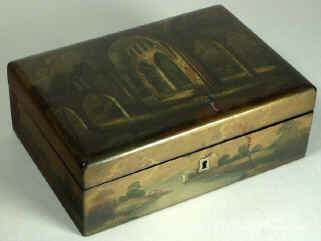 A painted Fully fitted Papier mch Sewing box Circa 1835. Enlarge Picture