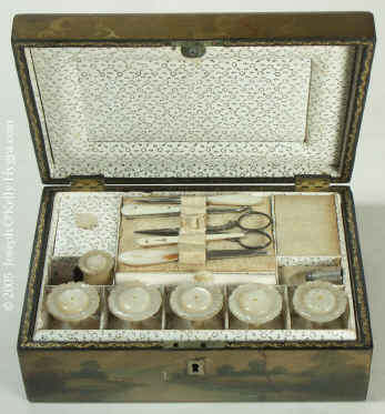 A painted Fully fitted Papier mch Sewing box Circa 1835. Enlarge Picture