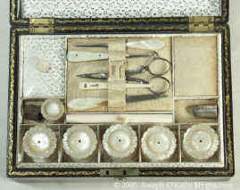 A painted Fully fitted Papier mch Sewing box Circa 1835. Enlarge Picture