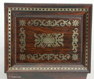 A fully fitted brass inlaid rosewood sewing box with gadrooned edges gilt side carrying handles and gilt feet. Inside the fully fitted sewing tray contains a set of turned ivory spools.  Circa 1810. Enlarge PictureEnlarge Picture