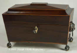 A Rare Rosewood Tea chest with twin cut crystal  tea canisters and central Bowl Circa 1815 Enlarge Picture