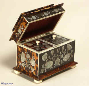 A fine  richly inlaid  twin compartment tortoiseshell tea caddy with pagoda top circa 1825. Enlarge Picture