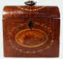 A single tea caddy in harewood with an oval medallion of figured wood Circa 1790.