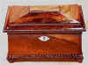 A wonderfully shaped three compartment tea caddy in Brazilian Rosewood circa 1825