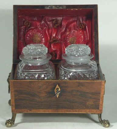 A Rare Rosewood Tea chest with twin cut crystal canisters Circa 1810. Please Click on image to enlarge