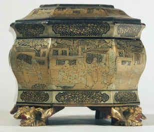 Chinese export lacquer tea chest with scenes of tea trading the interior fitted with metal canisters, circa 1840. chtealac03.jpg (127471 bytes)