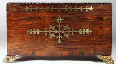 regneo07.jpg (83375 bytes) A Regency Neoclassical Rosewood Tea Chest with Brass inlay Circa 1810.