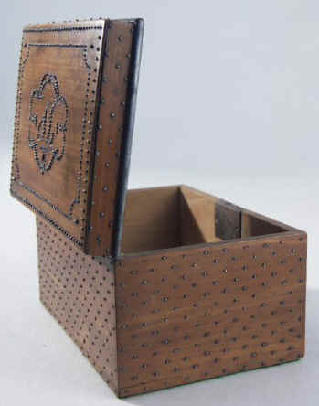 A continental pearwood tea caddy decorated with cut steel 1820-1840. (c) Hygra.com