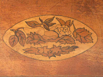 A three compartment inlaid  satin-birch tea caddy marquetry  depicting fruit  Circa 1795