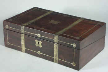 Dark mahogany writing box inlaid with brass Circa 1820.