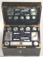 JB318: A very fine fully fitted figured coromandel dressing box by the Pittway Brothers  with engraved and gilded Bramah lock, stop hinges and accents and having a sprung drawer fitted for jewelry. Inside the box is fully fitted lined with leather and velvet and retains its cut crystal bottles and jars with hallmarked silver tops decorated with chassed repouss work and engine turning. There is a lift out tray with further tray containing dressing accessories. There is a lift out reversible mirror and document wallet in the lid. Circa 1863. Enlarge Picture