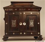 JB632: A dramatic William IV rosewood compendium table cabinet of lofty architectural form having turned rosewood feet and handles. It is inlaid with mother of pearl and opens both to the top and the and the front and has two drawers one with a liftout tray fitted for jewelry; the upper part is also fitted for jewelry, circa 1835 