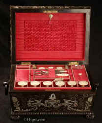 SB488: A sewing box of impressive form, decoration and workmanship, the interior lined with red silk and fully fitted with mother of pearl sewing tools, Circa 1825. Enlarge Picture