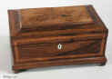 A Rosewood box the top of sycamore decorated with pyrography depicting a kilted boy, Bonnie Prince Charlie Circa 1815-20. Enlarge Picture