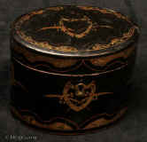 TC561: Rare 18th Century Chinese Export lacquer tea caddy of over form  with gilded decoration. Inside there is a lidded  pewter  tea canister. Circa 1780.    Enlarge Picture